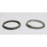 A platinum wedding ring, and a white metal full eternity ring, set with small old cut diamonds,