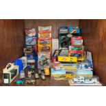 A collection of approximately forty assorted boxed die-cast scale model vehicles, comprising,