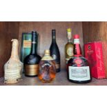 Seven assorted bottles of alcohol, comprising, a bottle of Grand Marnier Triple Orange, 1l, a