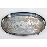 A large oval silver-plated serving tray, with pierced gallery, serpentine rim and pierced handles to