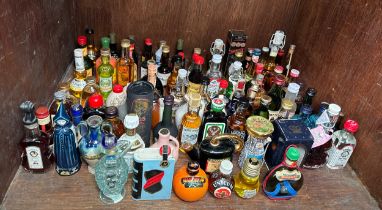 A collection of eighty-six assorted bottles of alcohol miniatures, comprising, spirits, liqueurs,