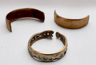 A 9ct gold wedding ring, (broken), and a 9ct gold and paste eternity ring, (broken) total weight 7.4