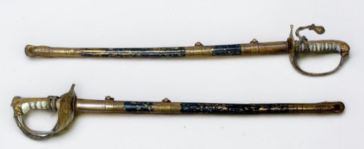 Two paper knives/letter openers modelled as Naval Officers dress swords, both with scabbards, 24.5cm