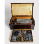 An early 20th century wooden cased Meccano Engineering for Boys outfit no. 2 with removable