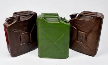 A WWII German jerry can stamped 1940, a British jerry can stamped WD 1945 and a USA jerry can, (3)