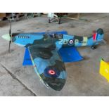 A large scratch-built wooden model of a Supermarine Spitfire, 240cm / 94.5-inches long (pictures