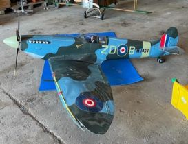 A large scratch-built wooden model of a Supermarine Spitfire, 240cm / 94.5-inches long (pictures