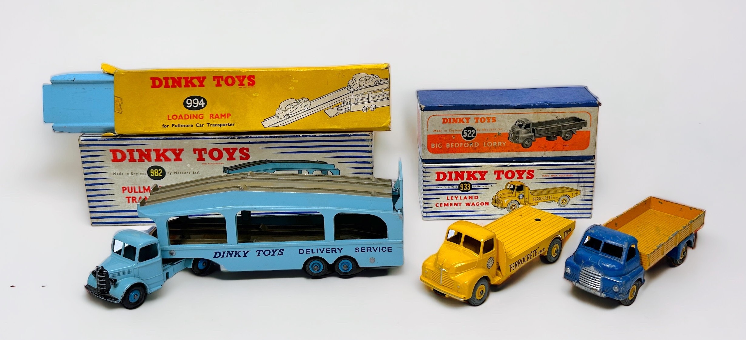Three boxed Dinky Toys die-cast scale model trucks, to include, Leyland Cement Wagon, No. 933, '