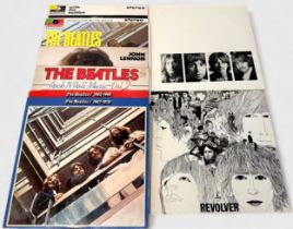 A collection of twenty-two assorted 12" vinyl LP records, comprising, The Beatles, Wings, Paul