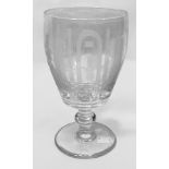 A 19th century charging glass, decorated with engraved, cut and etched Masonic devices, raised on