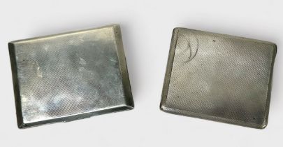 Two various silver cigarette cases, both with engine turned decoration, one by Charles S Green & Co.