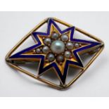 A 9ct gold seed pearl and blue enamel star brooch, weighs 4.2 grams.