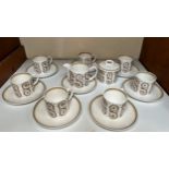 A Susie Cooper ‘Venetia’ pattern part coffee service, comprising, seven coffee cans, eight