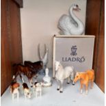 A collection of various ceramic figures of animals, comprising, Lladro, Beswick, etc., to include, a