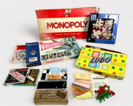 A quantity of assorted boxed vintage board games and puzzles, to include, Waddington’s