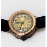 A ladies vintage 9ct gold cased wristwatch, the gilt dial with Arabic numerals denoting hours, on