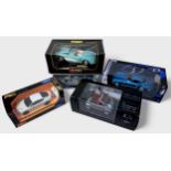 A collection of seven boxed assorted die-cast 1:18 scale model vehicles, comprising, American Muscle