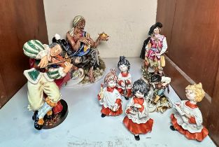 A Royal Doulton figure 'The fiddler,' together with various Capodimonte porcelain figures. (In