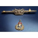 An early 20th Century 9ct gold Royal Navy sweetheart bar brooch, the Naval crown set with seed