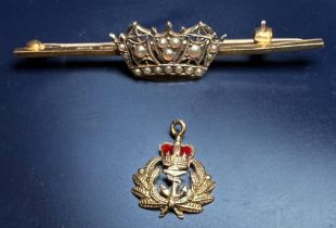 An early 20th Century 9ct gold Royal Navy sweetheart bar brooch, the Naval crown set with seed