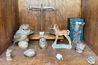 A small collection of Poole Pottery stoneware wildlife figures, comprising two owls, harvest