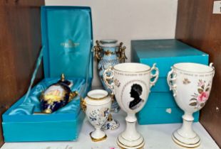 Three boxed Coalport limited edition urns and covers including ‘Ram’s Head vase limited edition