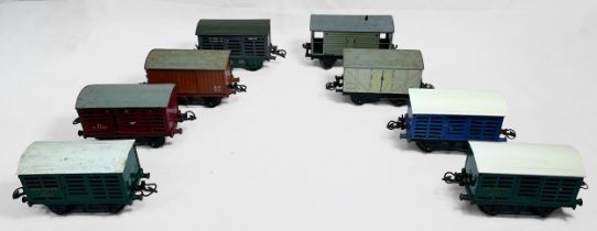 Twenty-Four assorted Meccano Hornby ‘O’ gauge model railway wagons and vans including 6T 2435, GW
