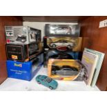 A collection of six assorted Mercedes-Benz die-cast 1:18 scale model vehicles, comprising,