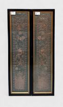 A pair of 20th Century Oriental silk and metallic thread embroidered panels decorated with