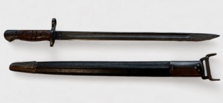 A WW1 US rifle bayonet, with 43cm / 17-inch fullered blade, coss-guard with muzle ring, two-piece