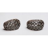 A pair of 9ct white gold earrings, set with 1.50cts of round diamonds, total weight 4.0 grams.