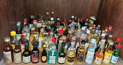 A collection of approximately one-hundred assorted bottles of alcohol miniatures, sealed and some