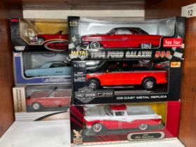 A collection of five assorted Ford die-cast 1:18 scale model vehicles, comprising, Maisto, ERTL -