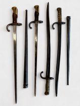 Four 19th Century French bayonets, comprising two M1866 pattern Chassepot sword bayonets with ribbed
