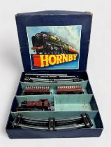 Four boxed Meccano Hornby clockwork train sets comprising Tank Paasenger set no.41 (lacking