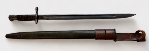 A WW1 US rifle bayonet, with 43cm / 17-inch fullered blade, coss-guard with muzle ring, two-piece
