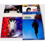 A collection of approximately 150 (one-hundred and fifty) assorted 12" vinyl LP records,