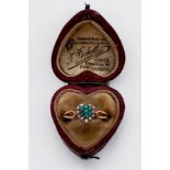 A 15ct gold heart shaped, turquoise and seed pearl ring, in heart shaped box, ring weighs 1.5 grams.