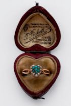 A 15ct gold heart shaped, turquoise and seed pearl ring, in heart shaped box, ring weighs 1.5 grams.