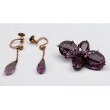 A pair of 9ct gold earrings, each set with a briolette amethyst drop, French screw-backs, together