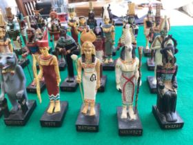 Thirty-five ancient Egypt divinities figurines made in resin all of which appear to be in good