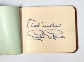 Two autograph books containing a good collection of signatures including Sir Austen Chamberlain,