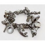 A small quantity of silver and costume jewellery, including a silver charm bracelet, a silver