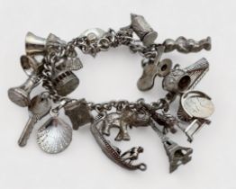 A small quantity of silver and costume jewellery, including a silver charm bracelet, a silver