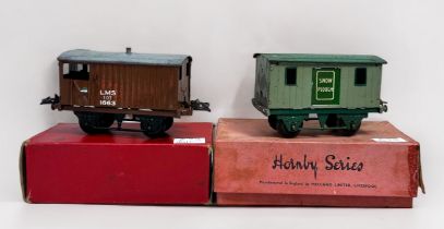 Four assorted boxed Meccano Hornby ‘O’ gauge vans and wagons including RS655 Brake Van, Snow Plough,