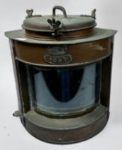 A copper ship's Port side lamp, with convex glass and plaques to front, 38cm tall, together with two