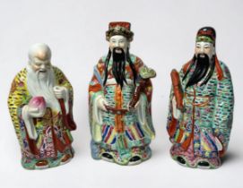 Three 20th century ceramic figures depicting Fu-Lu-Shou, Chinese mythology, a collective term for