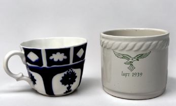 Third Reich ceramics, comprising a Luftwaffe pottery sugar bowl of cylindrical form with moulded