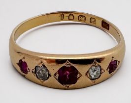 An 18ct yellow gold ruby and diamond ring, hallmarked 1877, ring weighs 3.9 grams.