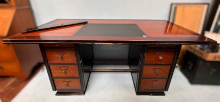 An Authentic Models captains desk, with inset black leather scribe to top and brass capped